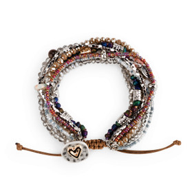 A beaded bracelet set with various purple, silver, blue and white beads and a heart clasp.