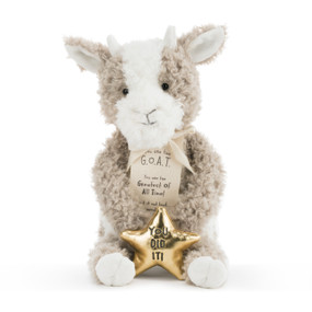 A tan and white plush goat with a sentimental message on the tag and a gold star between its hooves.