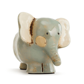 A pale gray/blue elephant with ivory ears.