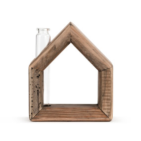 A wooden bud case in the shape of a house.