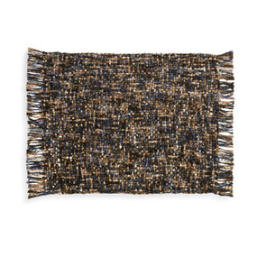 A black, brown, blue and green woven throw blanket.
