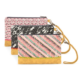 A set of three "Your Journey" multicolor and multi pattern zip pouches.
