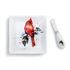 Square ceramic plate with a red cardinal and a small spreader with a holly branch