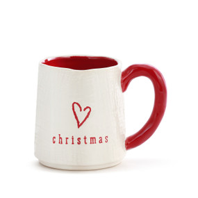 A white mug with a red handle, a red heart, and reads "Christmas" in a red font.
