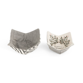 Two gray microwaveable bowl pot holders with various patterns.