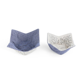 Two blue microwaveable bowl pot holders with various patterns.