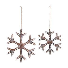 Two hanging wood ornaments shaped like snowflakes