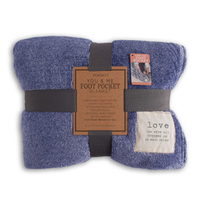 A dark blue and white striped foot pocket blanket with an ivory patch that reads "love how we're all wrapped up in each other". Folded and tied with a gray ribbon and cardboard tag.