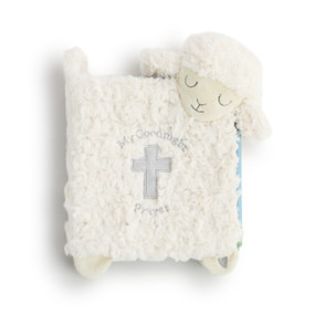 The outside cover of a soft children's book. Soft and white, with a lamb figure, and reads "My Goodnight Prayers".