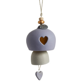 A white and light purple Inspired Bell" with a heart shape cut out, a light purple dangling charm, a silver pendant that reads "grandma", and a white cord string with wooden beads."