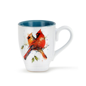 A white ceramic coffee mug with two watercolor painted cardinals around the outside, and a blue inner lining.
