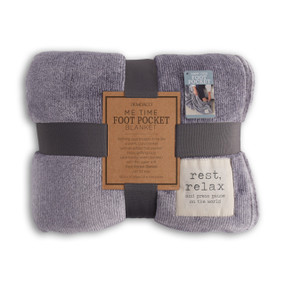 A dark gray and white striped foot pocket blanket with an ivory patch that reads rest, relax and press pause on the world". Folded and tied with a gray ribbon and cardboard tag."
