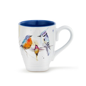 A white ceramic coffee mug with several watercolor painted birds around the outside, and a dark blue inner lining.