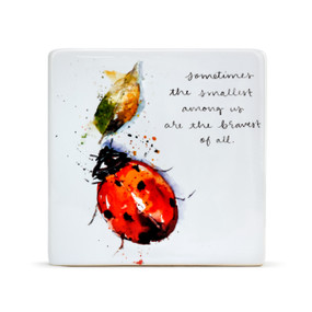 A white ceramic plaque with a watercolor painted ladybug and leaf, and sometimes the smallest among us are the bravest of all" in black cursive font."