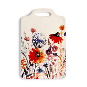 An off-white serving tray with a multi-color floral print stemming from the bottom.