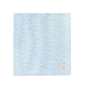 A soft bright blue woven "Big Brother and Me" cuddle blanket with a tan sentimental fabric patch stitched into the lower right corner.