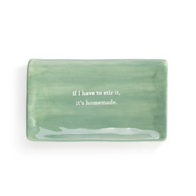 A ceramic, emerald green, rectangular spoon rest with if I have to stir it, it's homemade.""
