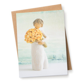 Light green notecard featuring female figure in cream dress, holding  bouquet of yellow roses; blank inside, kraft envelope