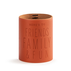 A leather can cooler that says "Here's to Friends Family & Fun".