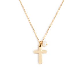 Close up image of a gold cross necklace with gold cross charm and white pearl bead.