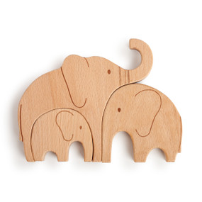 A simple wooden animal puzzle, with three pieces. Two large elephants and a their calf nestled together.