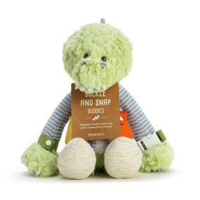 A multi patterned plush green dino with a buckle and a snap, and a cardboard tag that reads "buckle and snap buddies".