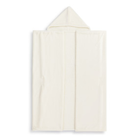 A cream snuggle blanket with a hood that can wrap around you laid out flat on a white surface.