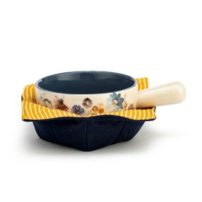 Cream ceramic soup crock with colorful flowers nestled in a dark blue fabric cozy with an orange and white striped interior.