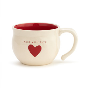 A large cream, ceramic, soup bowl mug with a red inner lining, a red heart, and reads "made with love" in red typewriter font.