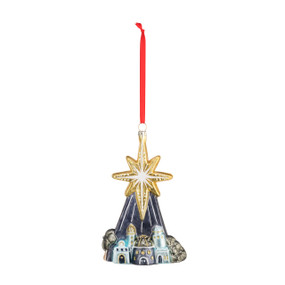 A front facing view of a blown glass ornament of a gold star over a cityscape of Bethlehem. With a red ribbon string.