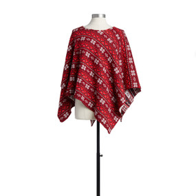 An alternative view of a light and dark red striped Christmas poncho, with an assortment of Christmas prints, such as snowflakes and trees. Placed on a white and black mannequin.
