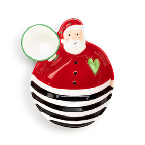 A red circular divided Santa dish, with a red top and a black and white striped bottom. With a small white bowl with a green rim attached.
