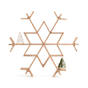 A medium washed "Large Wood Snowflake Wall Shelf" piece. Topped with two ceramic tree decorations.