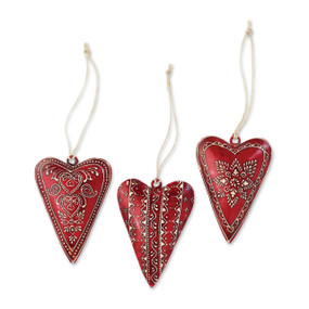 Set of three hanging red heart pendants