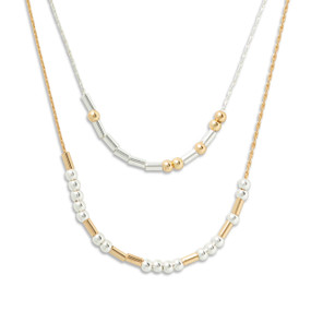 Silver and gold necklace with rods and beads spelling out morse code with the theme of beauty.