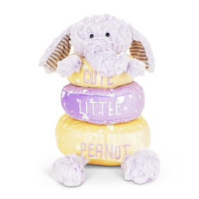 A stackable plush ring toy with three fabric rings in yellow and purple that say "Cute Little Peanut" with a plush head of a purple elephant on top.