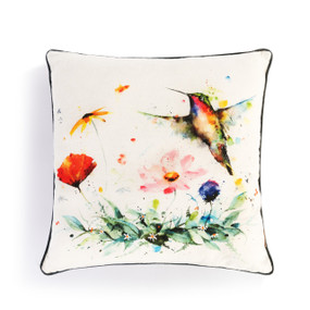 Square pillow with a watercolor image of a hummingbird flying above colorful flowers.