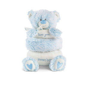 A stackable plush ring toy with three fabric rings in light blue and cream that say "love you sweet boy" and a plush head of a teddy bear on top.