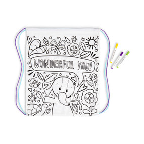 A white drawstring bag with an image of a elephant and other fun elements outlined in black and ready to be colored. Shown with three markers and the blue and purple strings out on the bag.