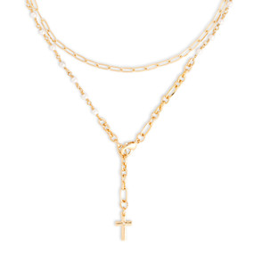 A gold chain necklace/choker with small white beads and a gold cross charm.