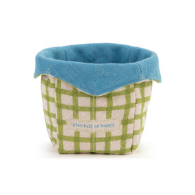 A green and cream plaid fabric ice cream cozy that says "pint full of happy" with a blue fabric on the inside.