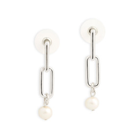 A pair of silver metal hanging earrings with a small pearl attached at the bottom.