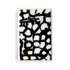 A white ceramic small tray with artwork created by ArtLifting artist Linda King. The image is a black background with white painted patches.