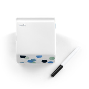 A white ceramic write on notepad with "to do:" at the top and blue and green dots around the sides. Displayed with a black marker.