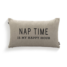 A rectangular tan pillow that says "Nap Time is My Happy Hour" in black.