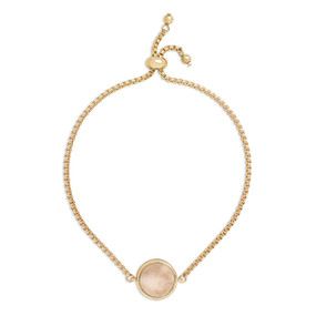 A gold chain adjustable bracelet with a round marble taupe charm.