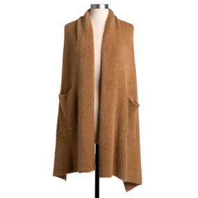 A camel colored wrap with two front pockets displayed on a mannequin.