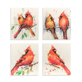 A set of four biodegradable reusable dish cloths with different images of cardinals on them.