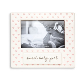 A cream ceramic photo frame with pink hearts and a ceramic tag that says "sweet baby girl".