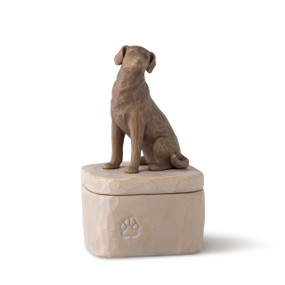 Front: gray square resin box with lid, 3-D figure of dark color dog atop lid